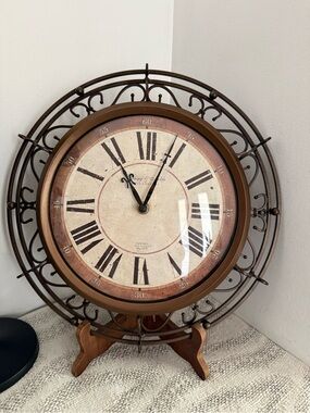 Antique-Style Brown Sterling and Noble Wall Clock with Roman Numerals